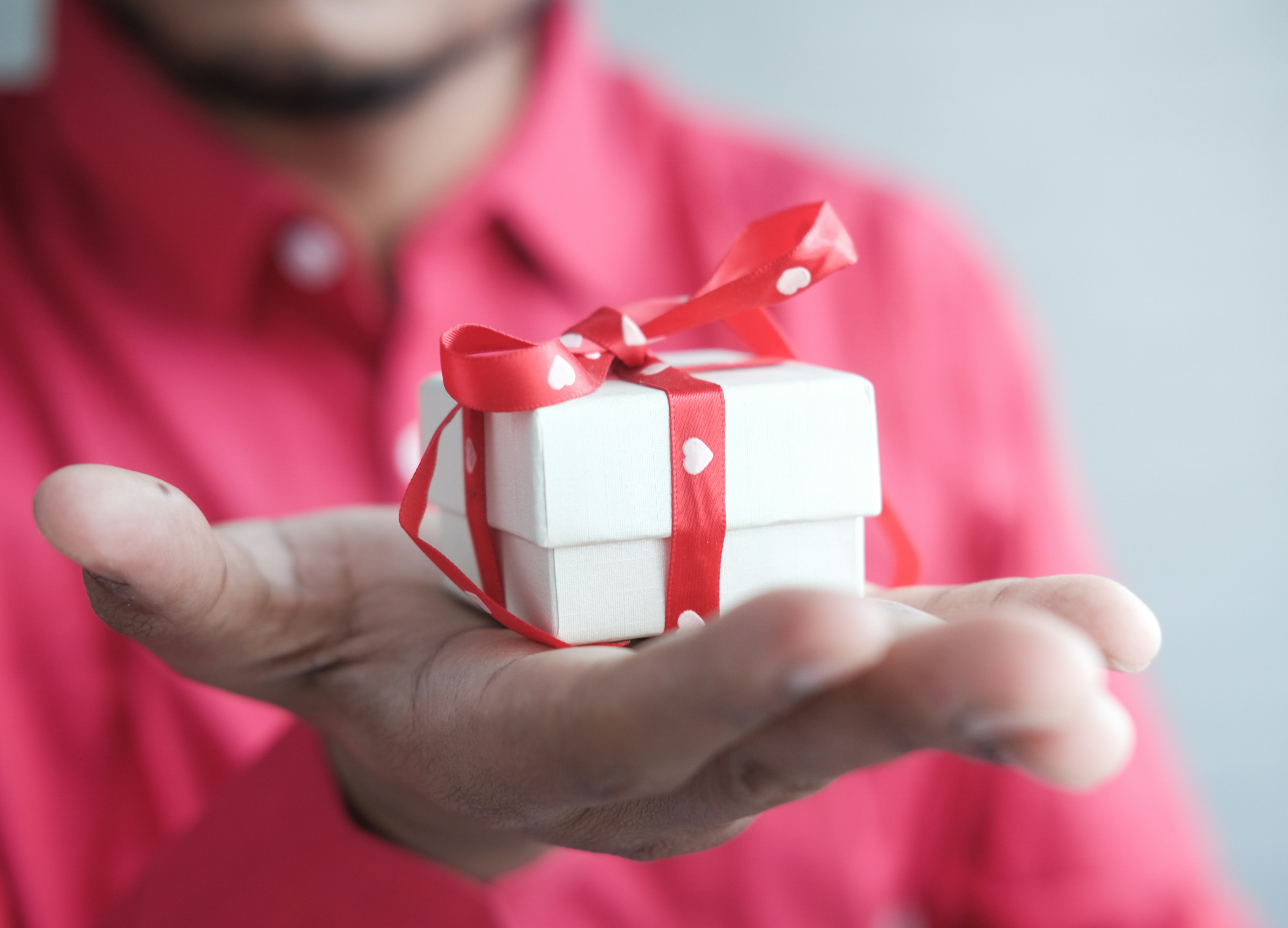someone offering a gift