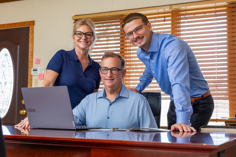 Mike and Rebecca with Michael wearing glasses