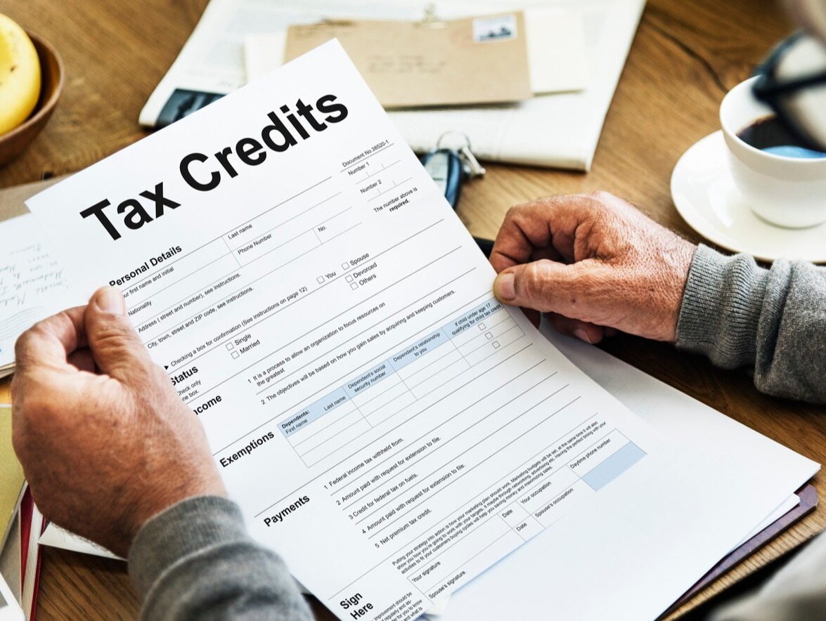 Person holding a tax form