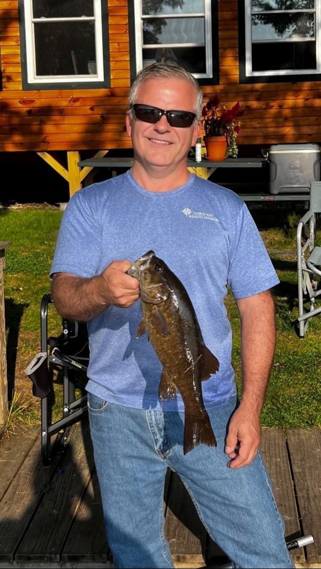 Christian holding a fish