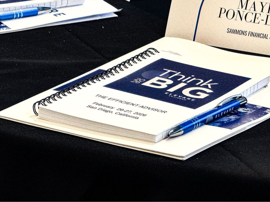 John Ledesma with Think BIG banner