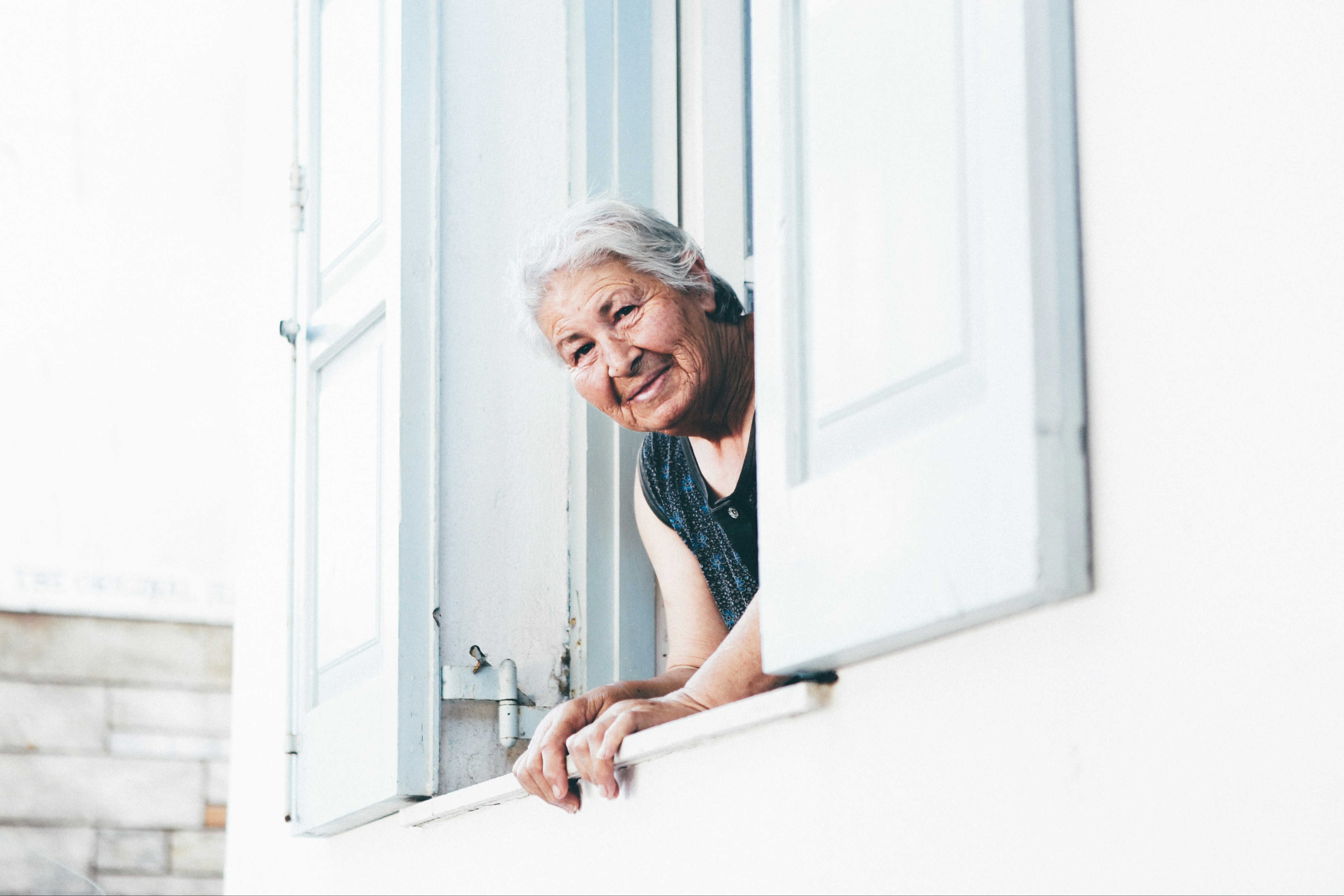 Woman looking out of a window
