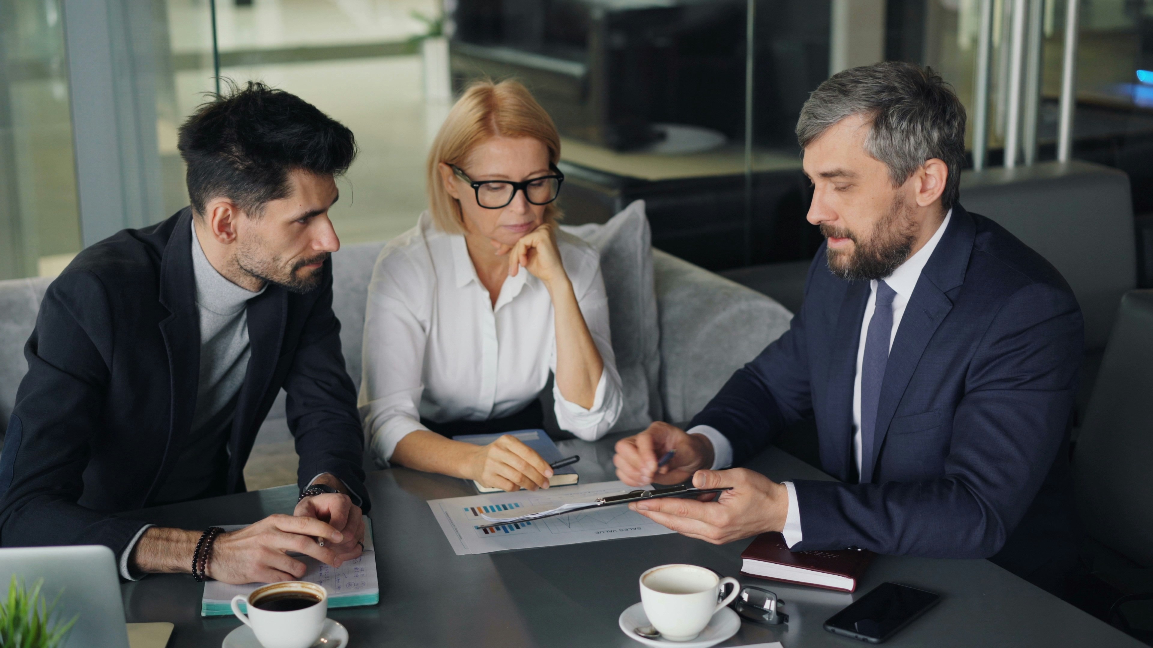 Professional financial advisor helping clients create a personalized wealth management plan