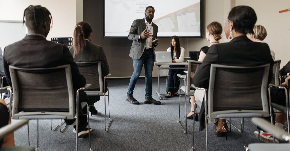 Financial professionals participating in continuing education representing the CFP Board's mandatory CE requirements that keep Dallas Texas financial planners current on retirement tax and estate planning developments