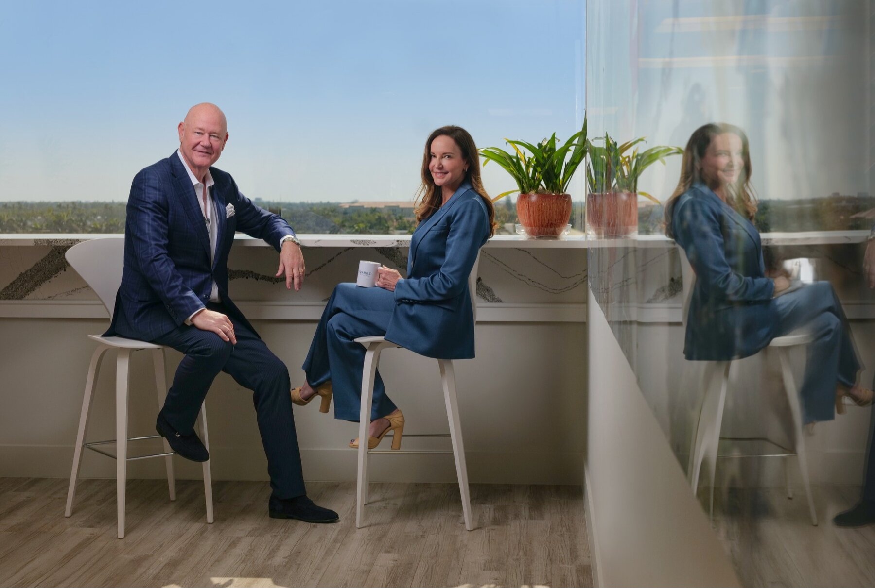 Edwards Asset Management leaders seated together in the Fort Lauderdale office