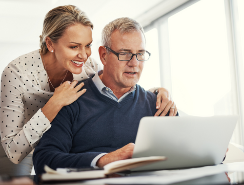 older couple looking at laptop