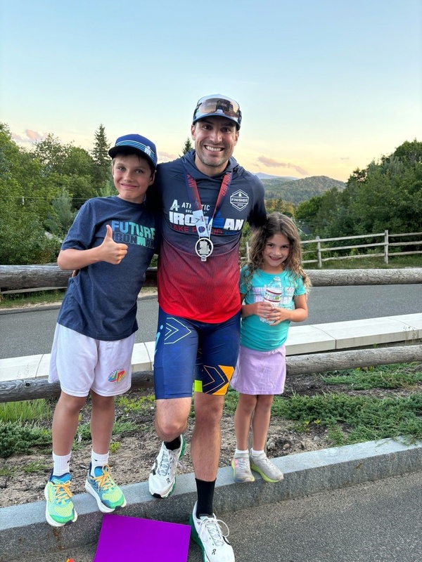 John Foran Takes on the IRONMAN® Lake Placid 2024: A Journey of Dedication and Triumph