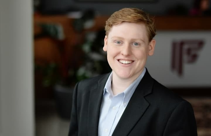 Freedman Financial Promotes Christian Karcher, CFP®