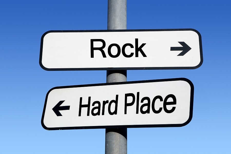 The Fed - Between A Rock & A Hard Place