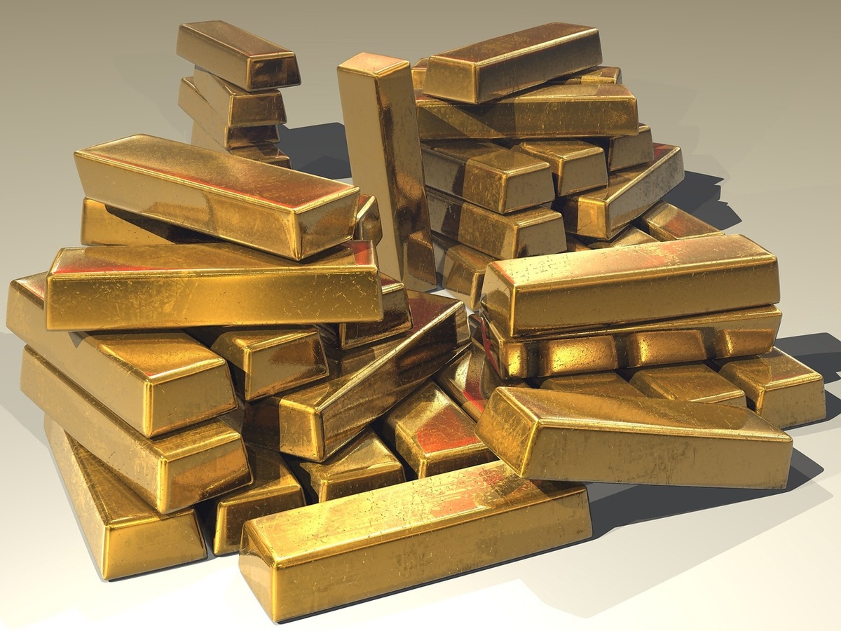 Should you buy gold?  Looking at both sides of that bright, shiny investment