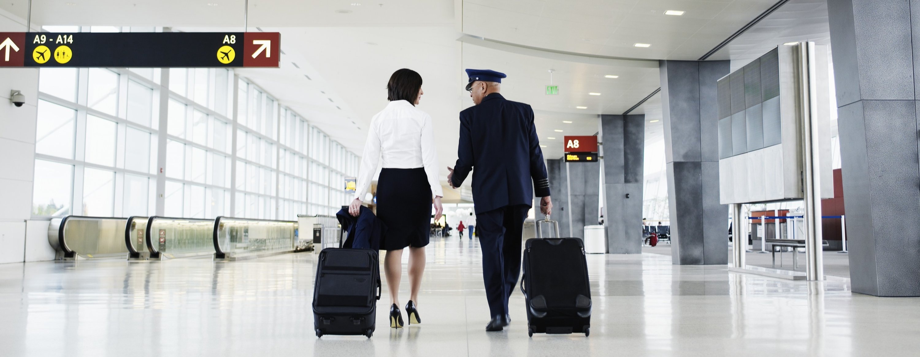 Pilots Walking At Airport