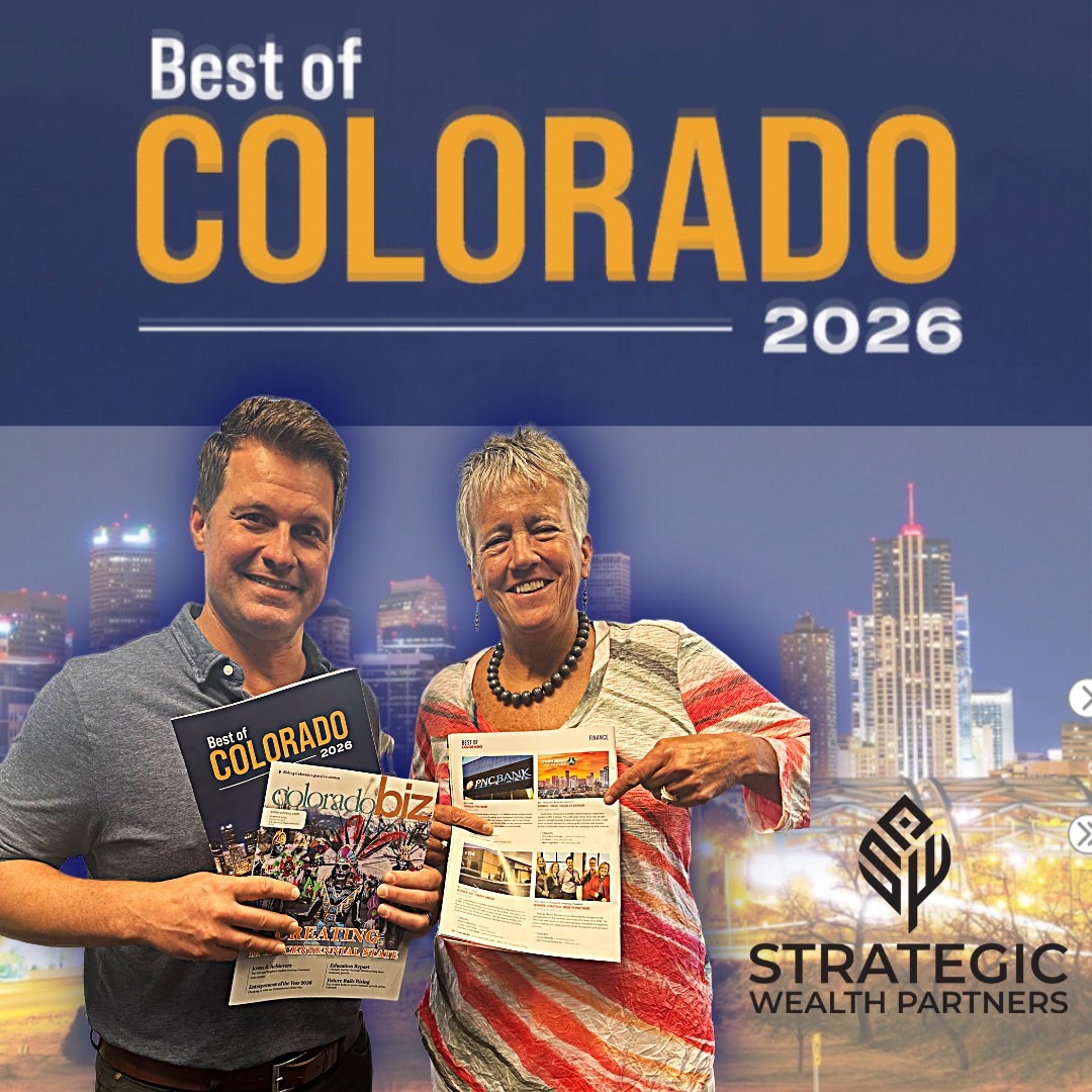 Two SWP principals holding copies of the Best of Colorado 2026 and ColoradoBiz magazines