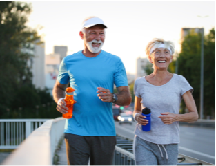 Man and woman jogging outside