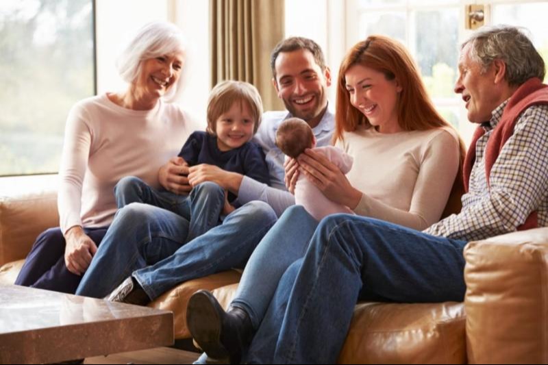 Family sitting on a couch