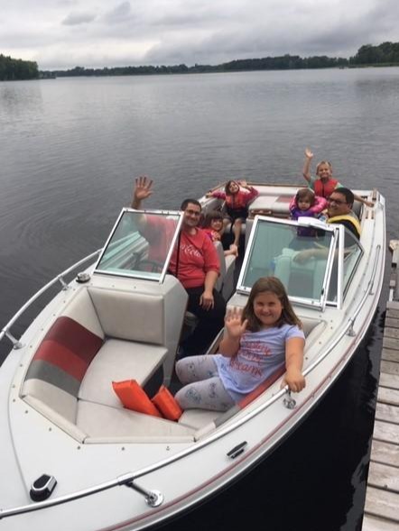 John and family on boat