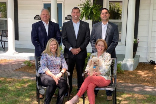 Lake Norman Advisors financial planning team outside their Lake Norman office in North Carolina.