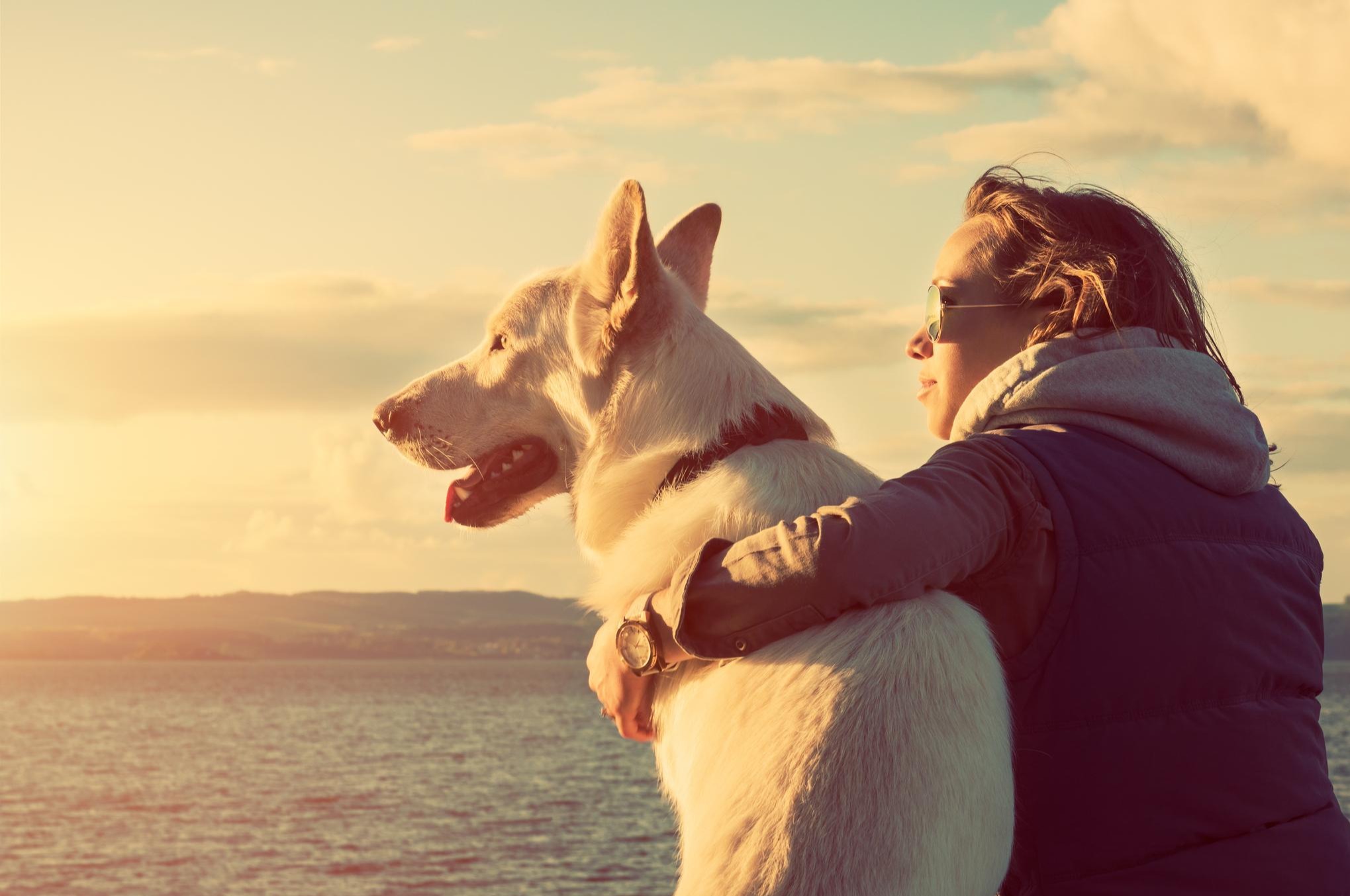 Woman at the beach with her dog