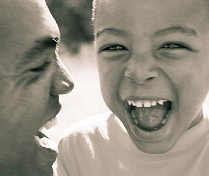 Parent with child pictured in sepia