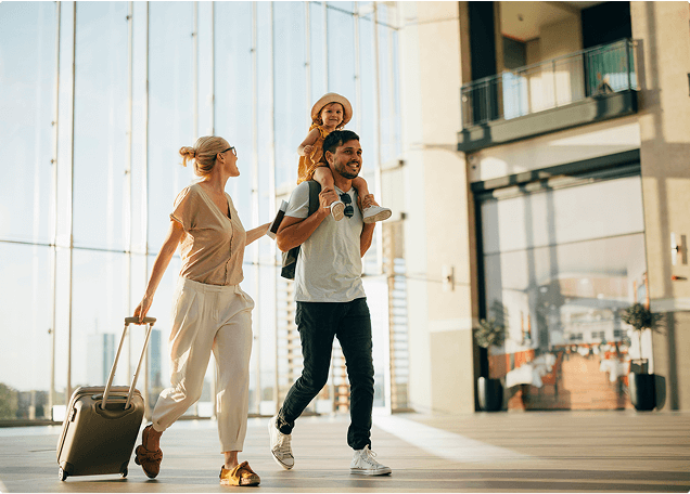 family of 3 arriving at hotel