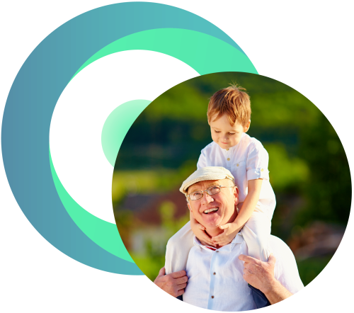 Grandfather carrying his grandchild on his shoulders