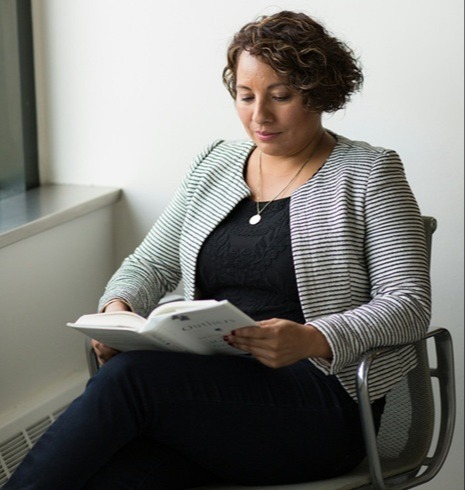 Woman reviewing financial documents after divorce — Advance Financial Lighthouse Oklahoma City