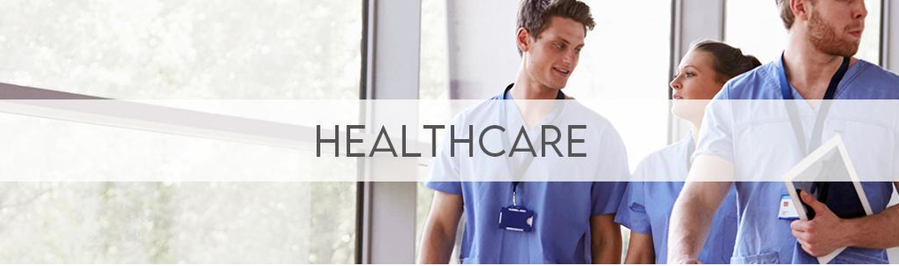 man and woman in scrubs talking