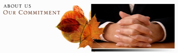 Photo of interlocking fingers on a table with an autumn leaf next to it. Text to the left reads: About Us Our Commitment