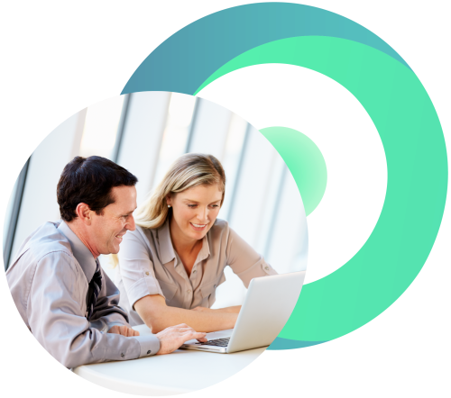 Two people working together looking at a laptop