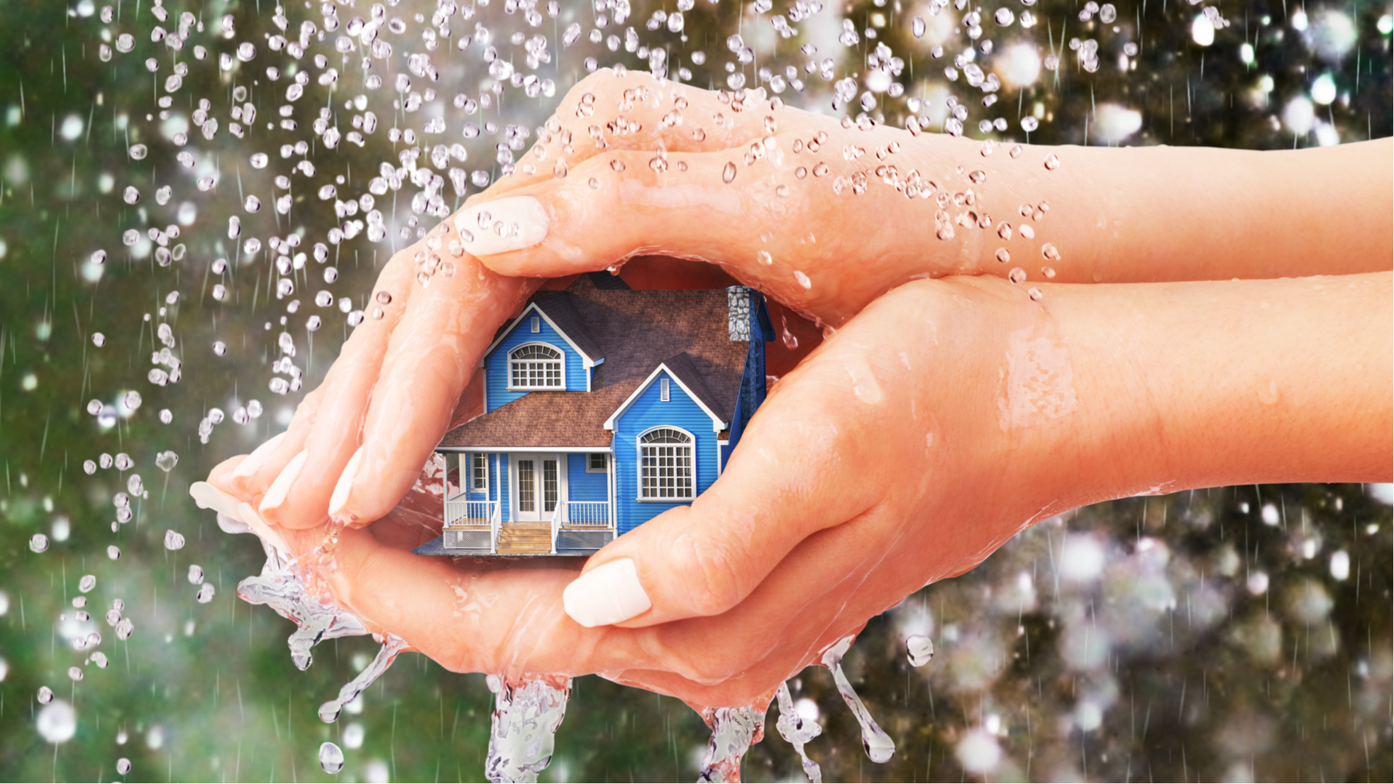 Photo image of hands holding a blue house