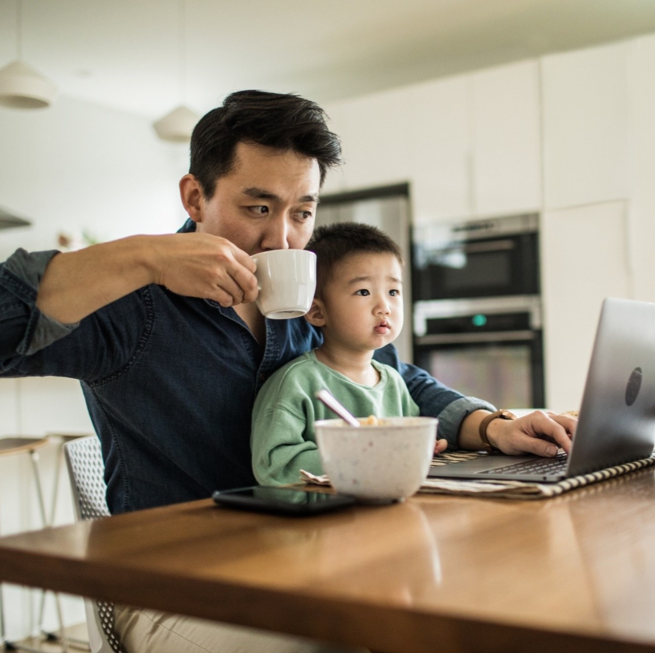Father Checking Laptop