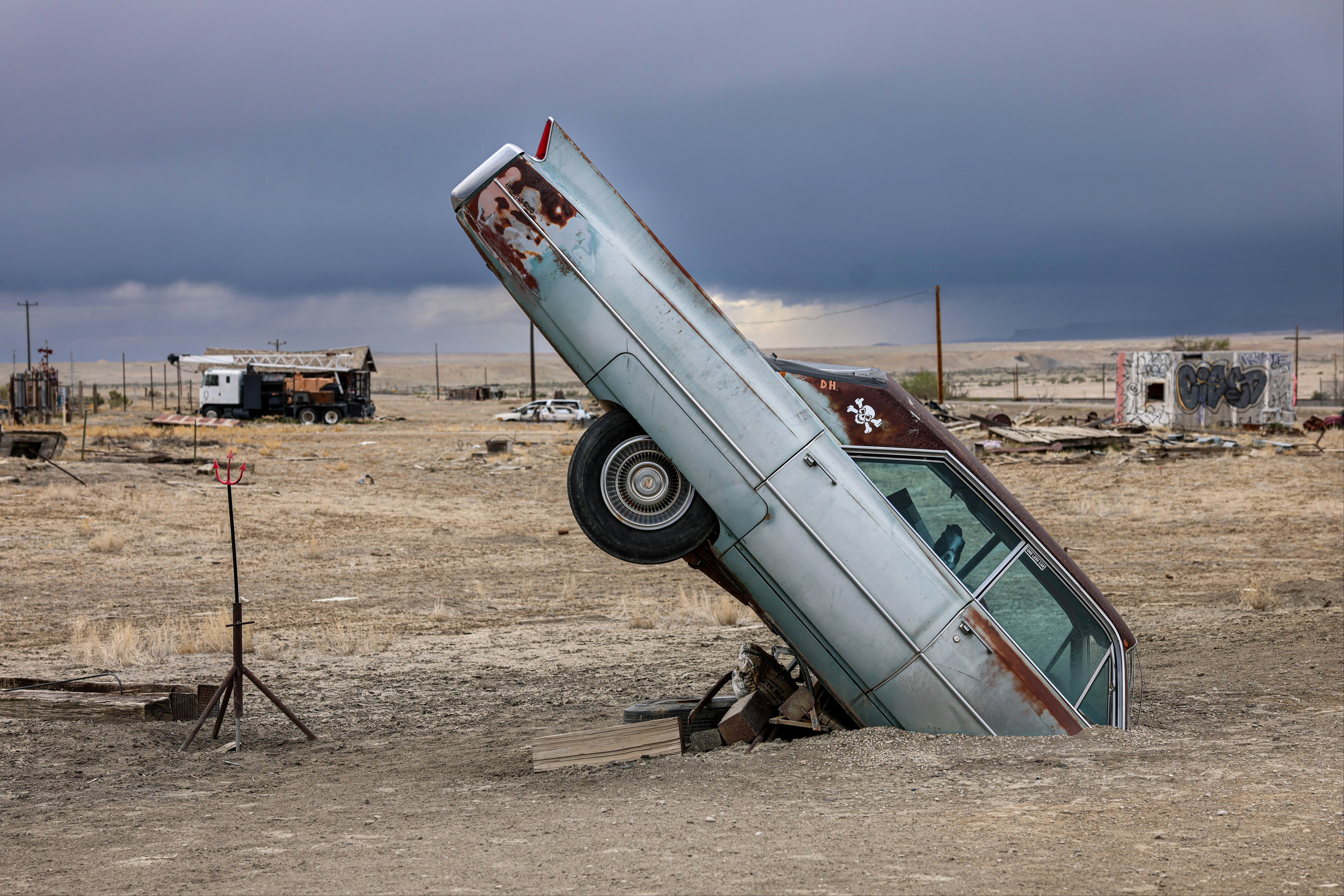 car fallen in hole