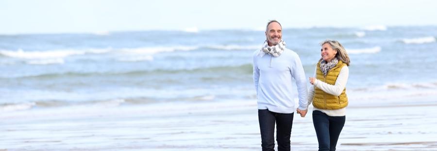 Couple walking on a beach