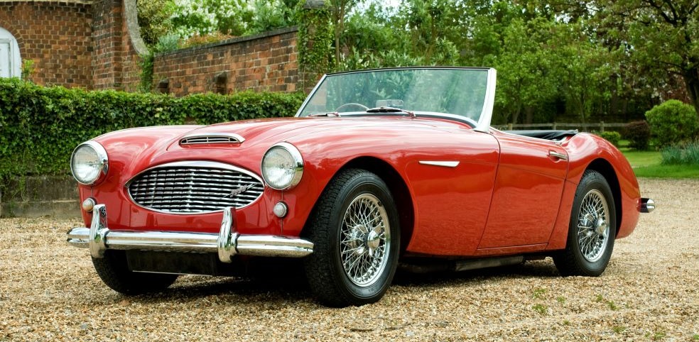 Photo of a red 1960 Austin-Healey 3000 BT7 Mk1