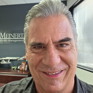 John E. Meinert,