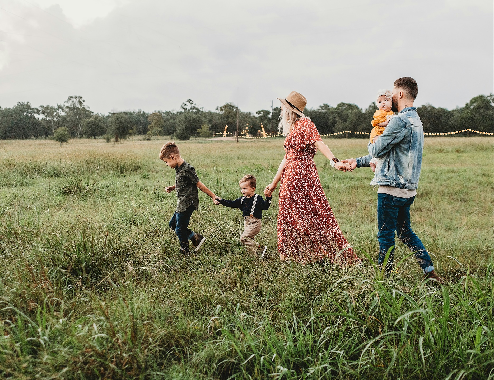Family walking together in field