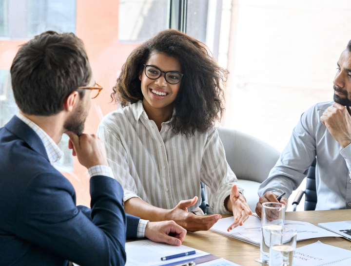 Photo of Professionals Having a Meeting