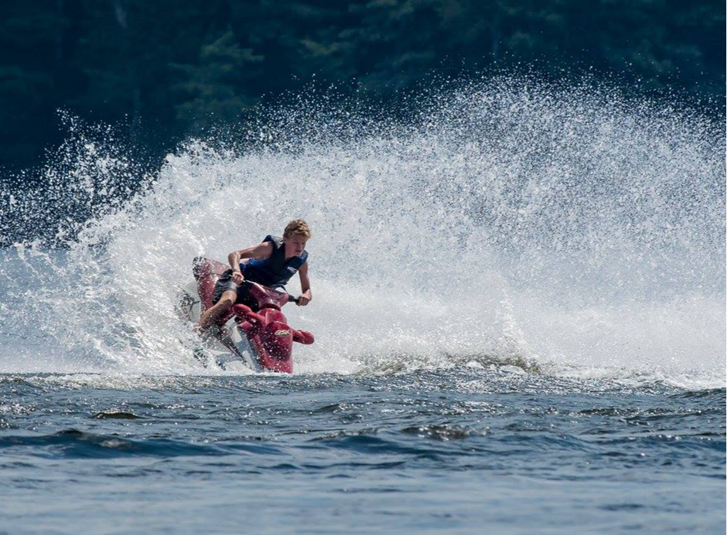 Photo of someone jet-skiing