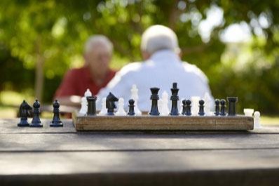 2 Older Men playing chess