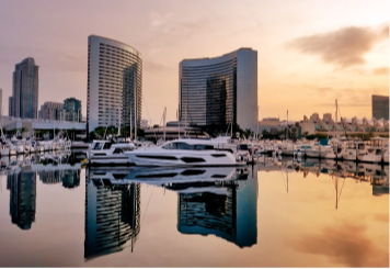 Boat docks and buildings at sunset