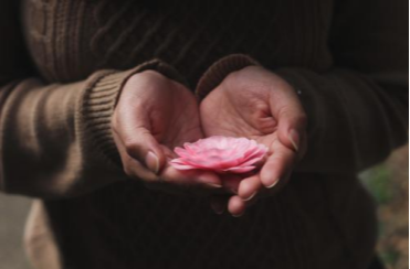Woman-Holding-Flower
