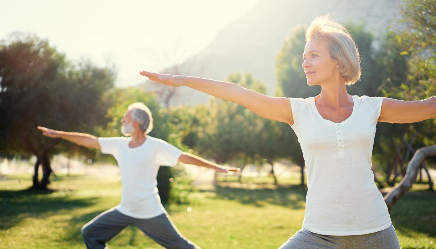 old couple doing yoga