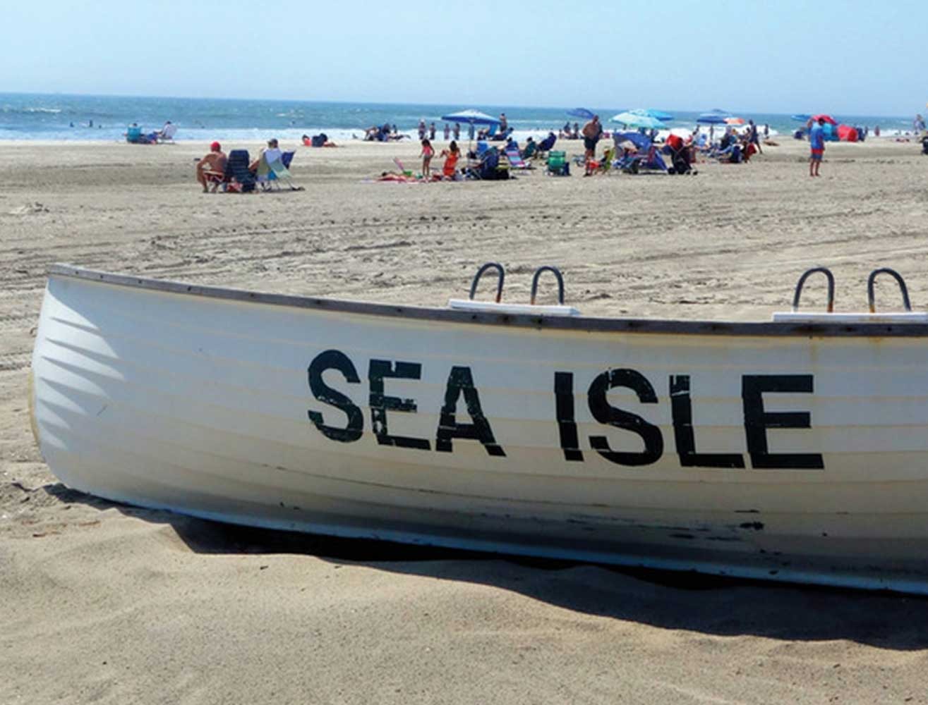 Sea Isle written on boat at the beach