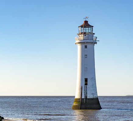 Lighthouse in a body of water