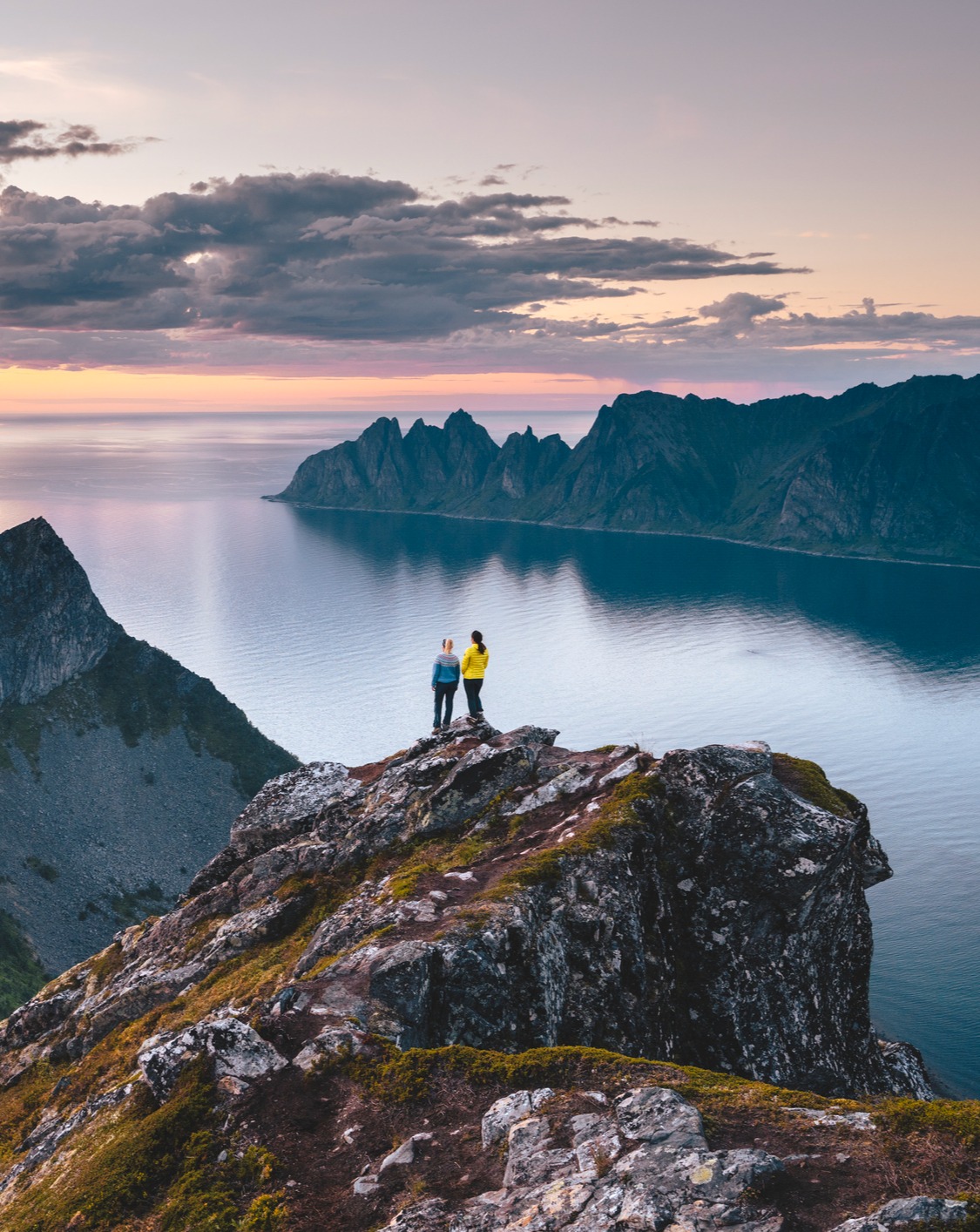 Two people on a mountaintop