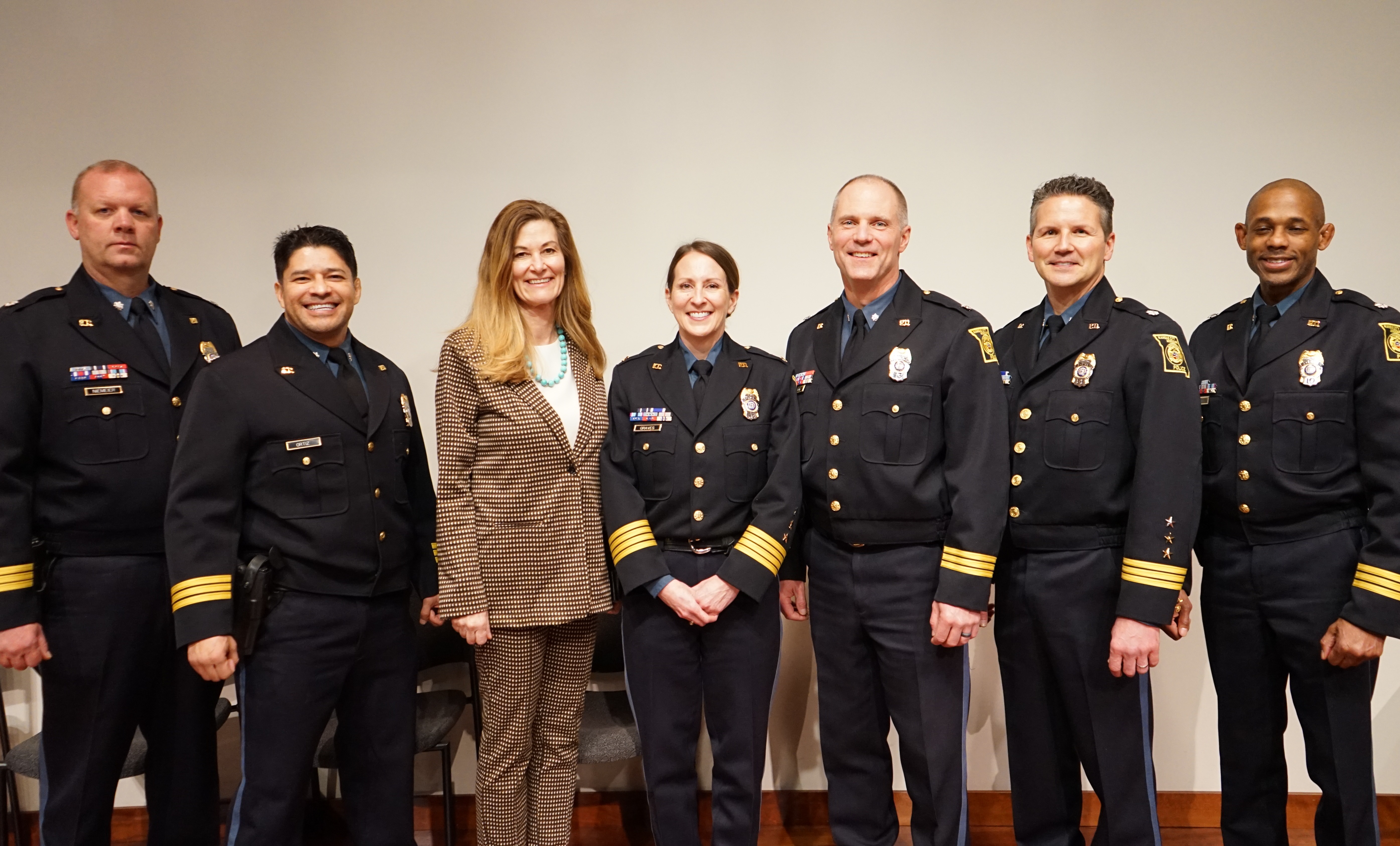 Dawn Cramer and Chief of Police and Deputy Chiefs