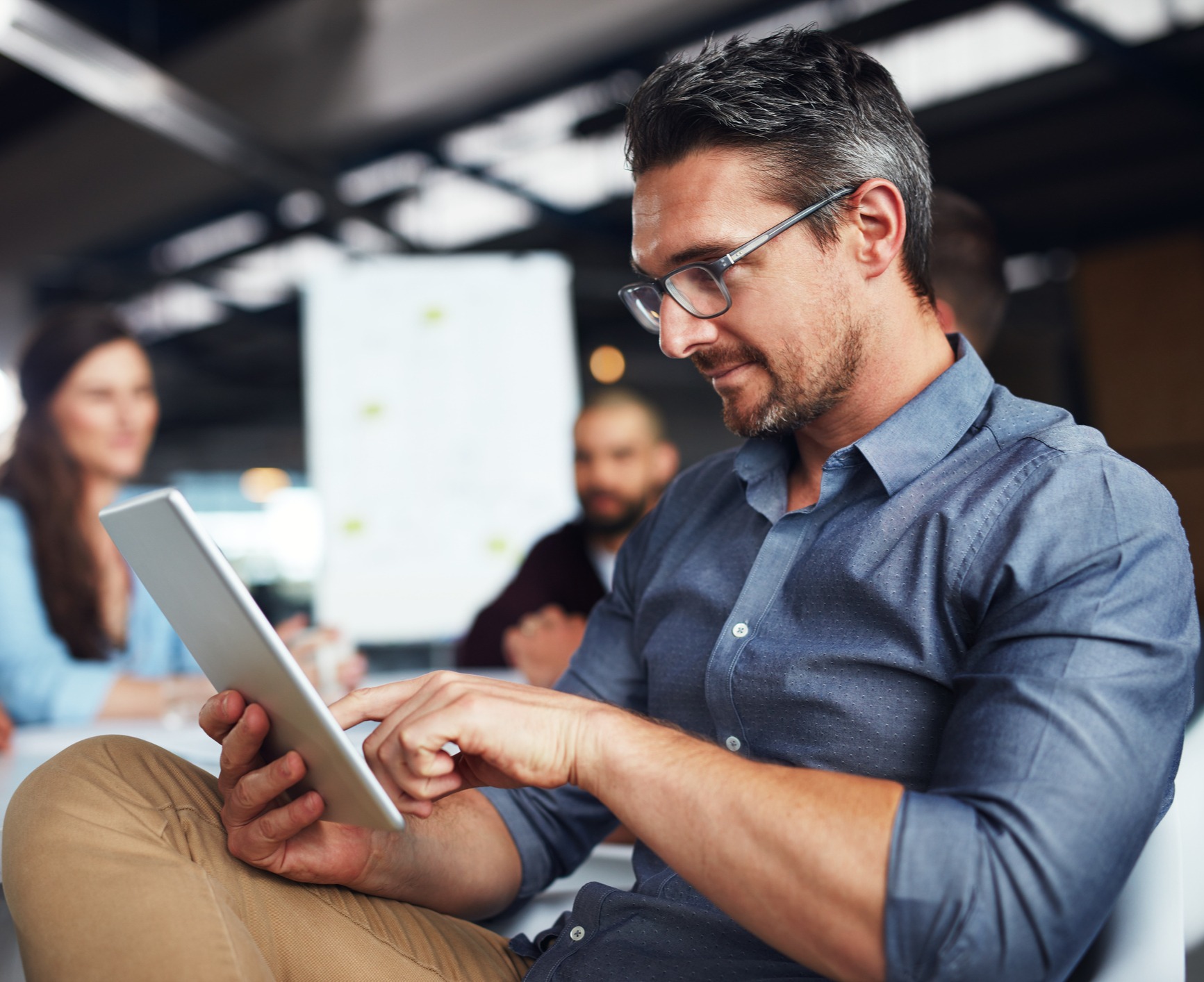 Man intently reading a document