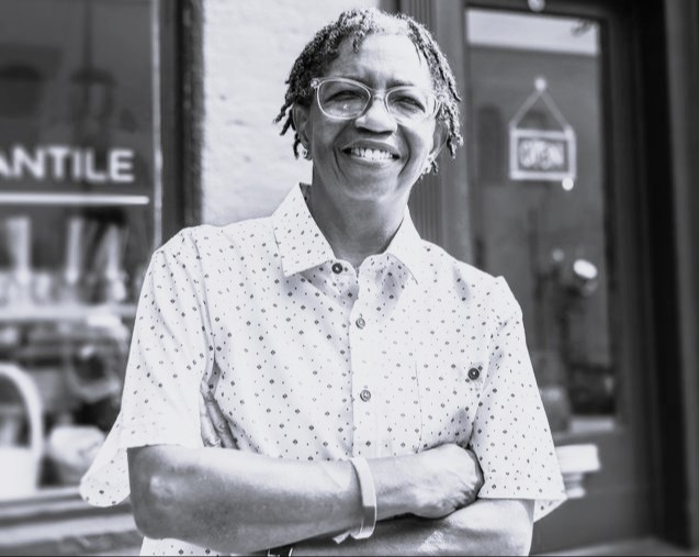female business owner with arms crossed