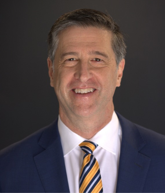 Travis Holland Headshot<br/>