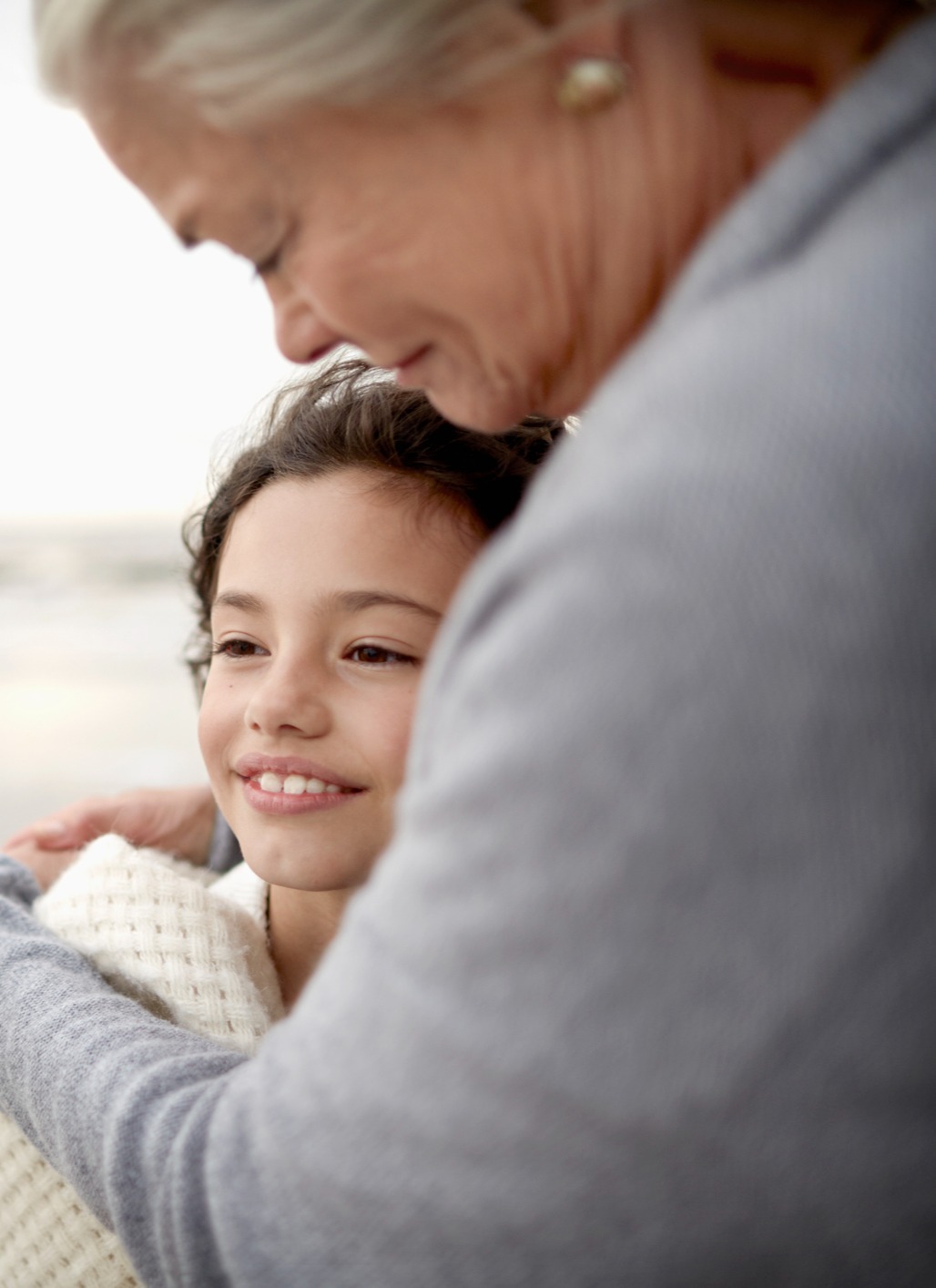 Grandmother hugging her grandchild