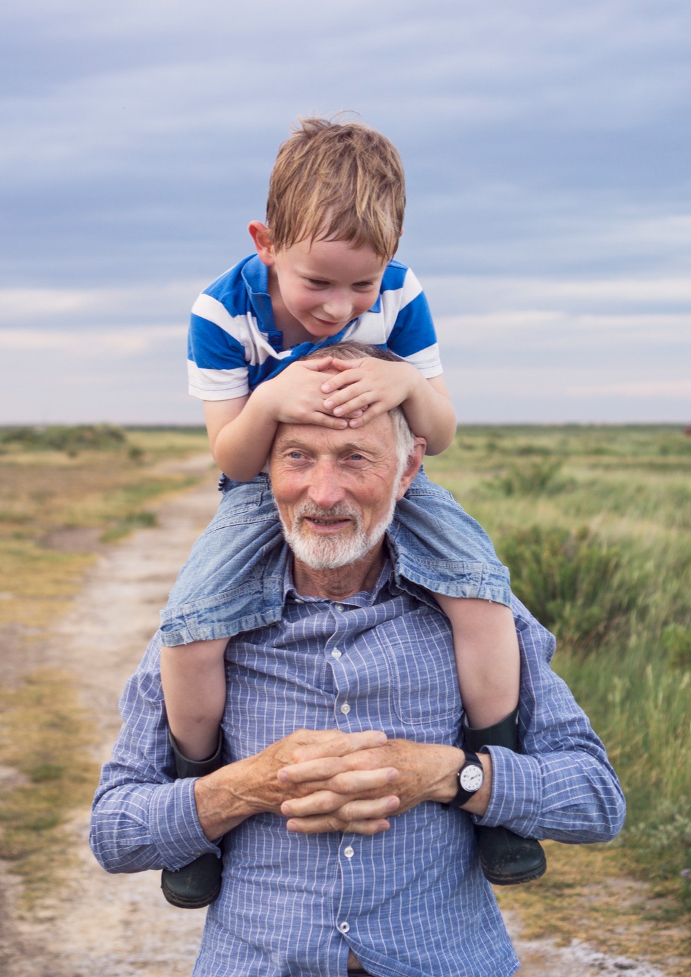 Grandson on Grandfathers shoulders